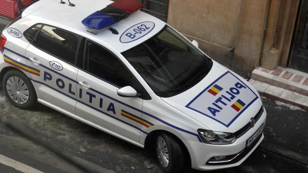 Un barbat prins beat la volan de doua ori