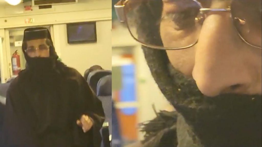 Bărbat deghizat în călugăriță cerșește în tren Iași-Cluj Barbat deghizat in calugarita cerseste in tren Iasi Cluj