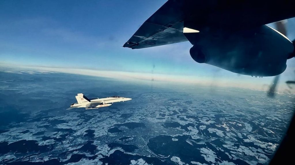Avionul lui Nicusor Dan escorat de F 18 elvetiene