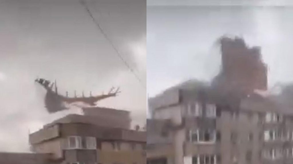 Furtuna de Cod Rosu Un acoperis a fost smuls de vant de pe un bloc si a cazut peste un barbat